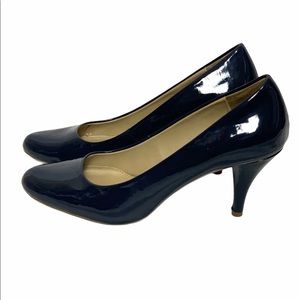 Navy Bandolino Patent leather semi round toe heel